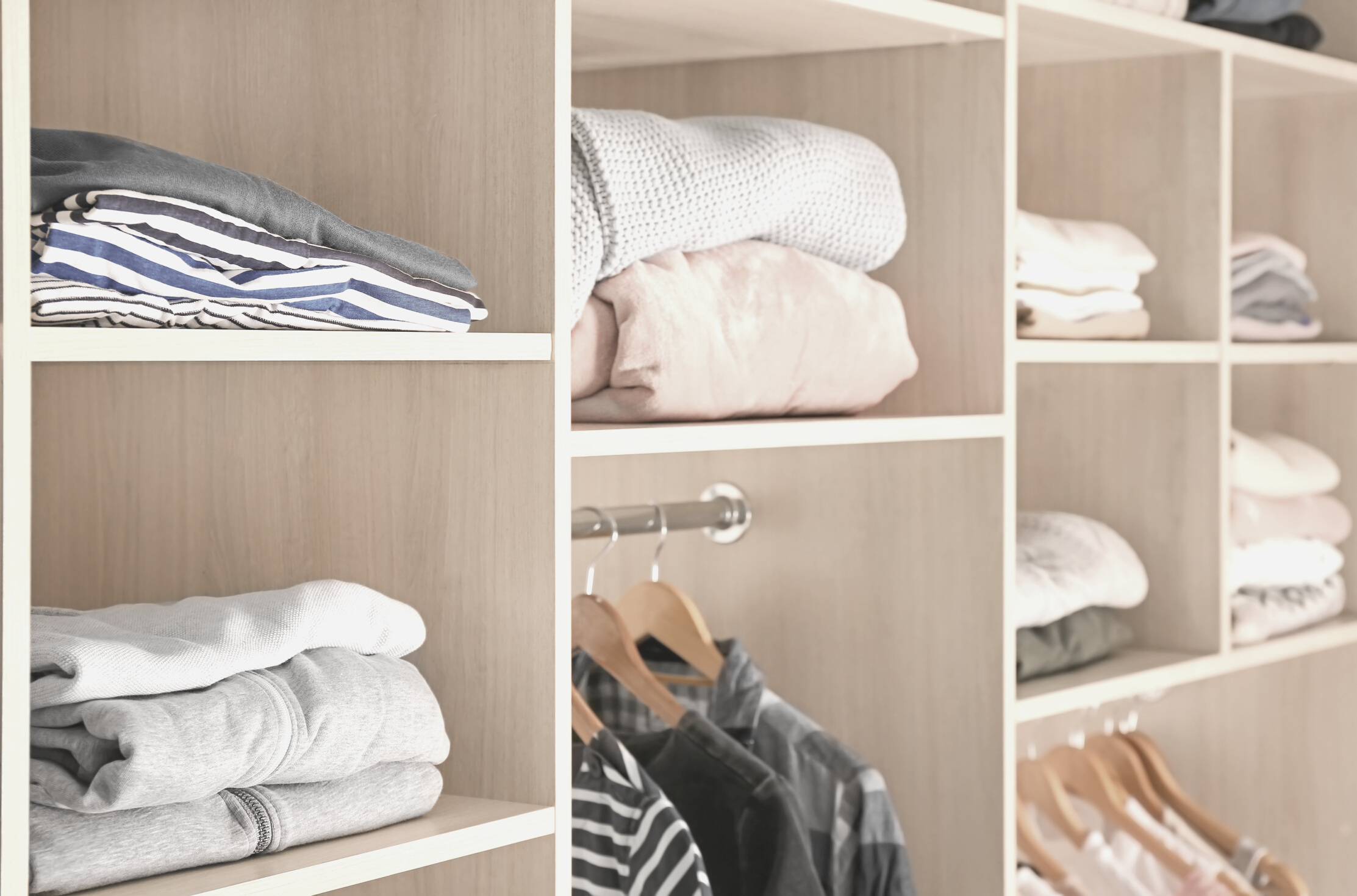 Organized Closet with Clothes